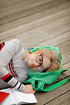 Student fell asleep reading lectures