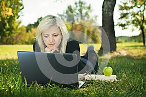 Student girl with laptop studying