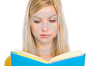 Student girl reading book