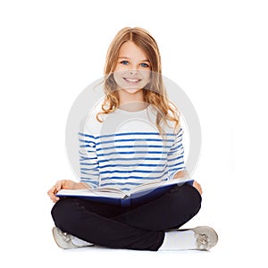 Student girl studying and reading book