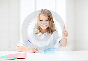 Student girl studying at school photo