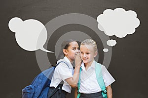 Student girls with speech bubbles whispering against grey background