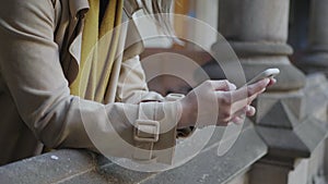 Student hands using smartphone in hallway. Businesswoman working on cellphone