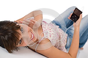 Student - Happy female teenager listen to music
