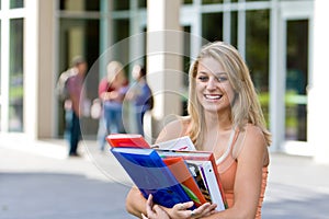 Student Holding Books