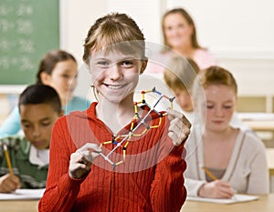 Student holding helix in classroom