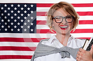 Student is learning English as a foreign language on American flag background