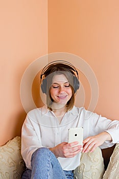 Student learning in online library, distance education. Girl wearing headphones, woman taking classes