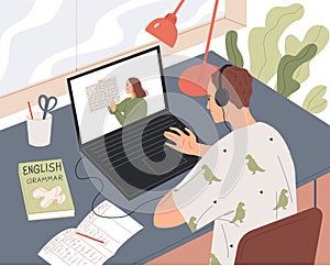 Student learns online, watching the lesson on the laptop screen.