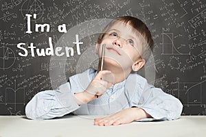 Student little boy and science background. Kid is thinking about education