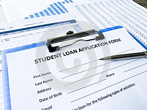 Student loan application form document on table