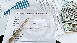 Student loan application form document on table