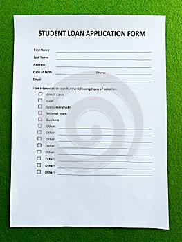 Student loan application form document on table