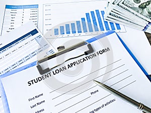 Student loan application form document on table