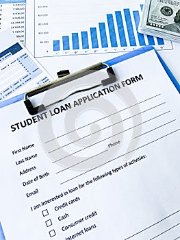 Student loan application form document on table