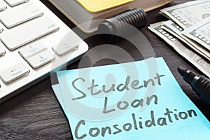 Student loan consolidation Money on a table.