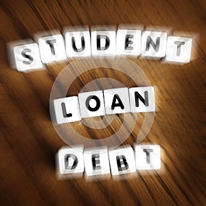 Student Loan Debt Words Letters on Dice Representing Massive Paymentsj Zoom Motion photo