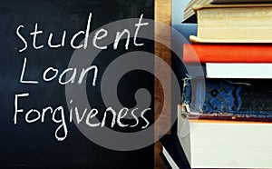 Student loan forgiveness handwritten on a blackboard photo