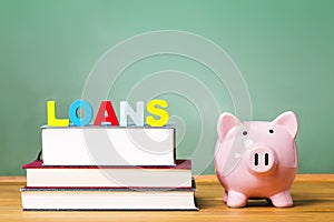 Student loan theme with textbooks and piggy bank