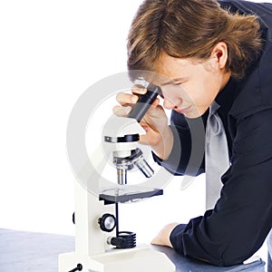 Student Looking Into Microscope