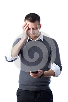 Student looking worried at smartphone device