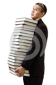 Student with many books tired