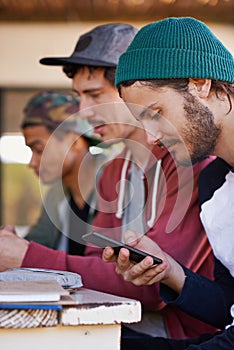 Student, mobile phone and couple of friends for research project, studying and socialising on campus. Smartphone