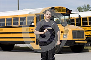 Student near the school bus