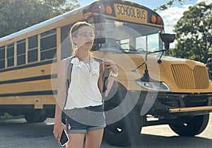 Student near the school bus