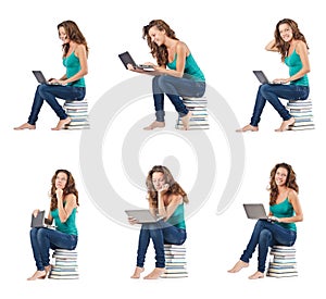 The student with netbook sitting on books