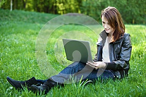 Student with notebook outdoor