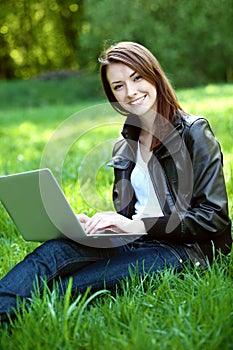 Student with notebook outdoor