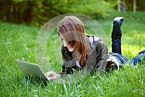 Student with notebook outdoor