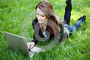 Student with notebook outdoor