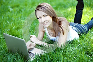 Student with notebook outdoor