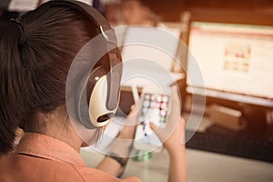 Student online testing exercise concept : Asian girl students learning on smartphone and computer pc for watching video tutorial