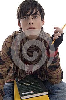 Student with pencil and books