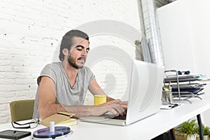 Student preparing exam relaxed or informal hipster style businessman working with laptop computer