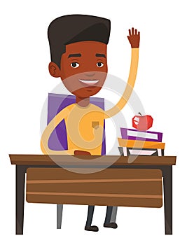 Student raising hand in class for an answer.