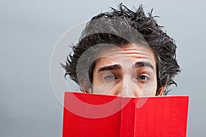 Student reading a suspense novel photo