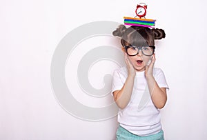 Student ready for school. Children`s Stationery for school. Kid with notebook and pen in hands.