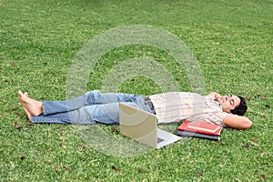 Student relaxing on campus