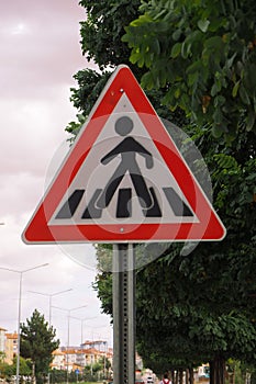 Student school crossing sign on the vehicle road