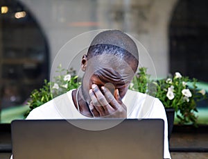 Student Sitting with Laptop