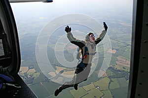 Student skydiver jumps from an airplane