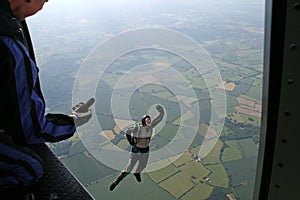 Student skydiver jumps from an airplane