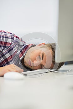 Student sleeping in the computer room