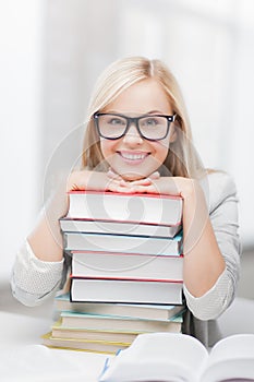 Student with stack of books