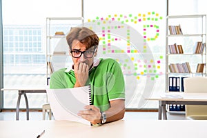 The student struggling at the exam in classroom