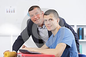 student and teacher in class